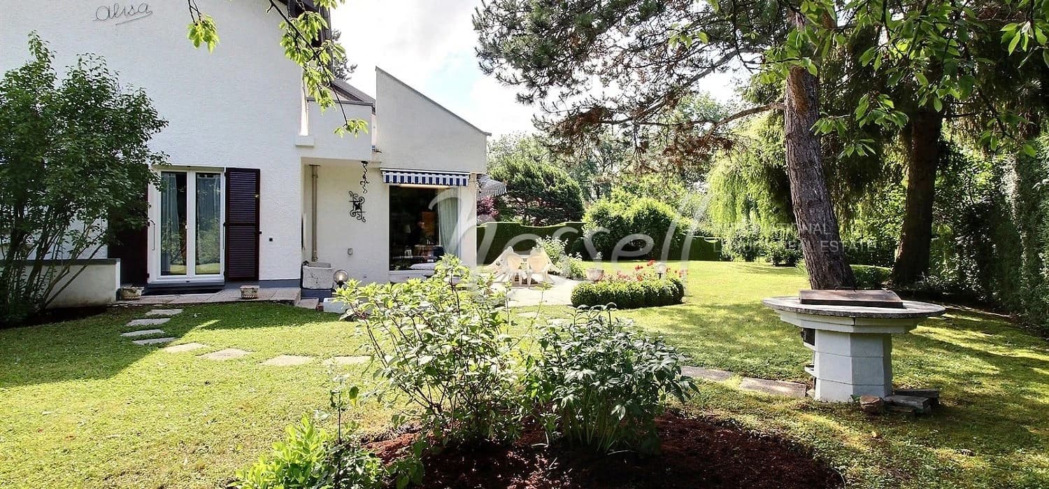 Ravissante maison jumelée dans un écrin de verdure